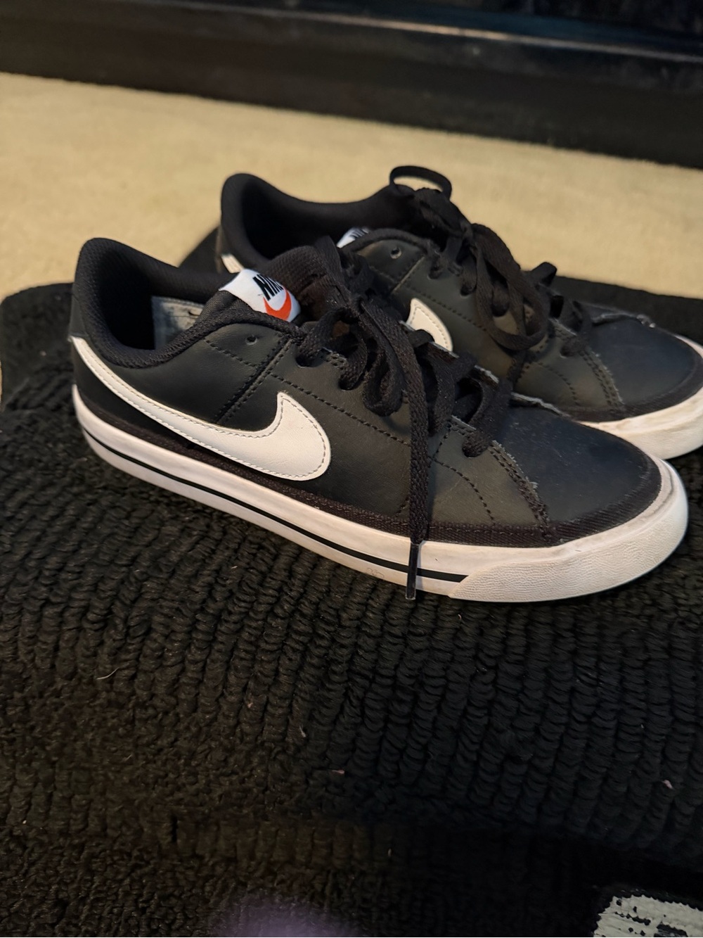 Nike Kids Black Sneakers with White Swoosh